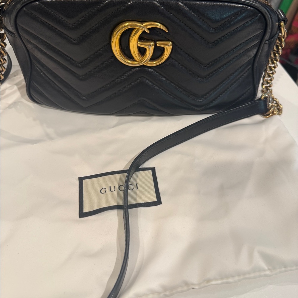 Gucci Black Quilted Leather Crossbody Bag with Gold Accents